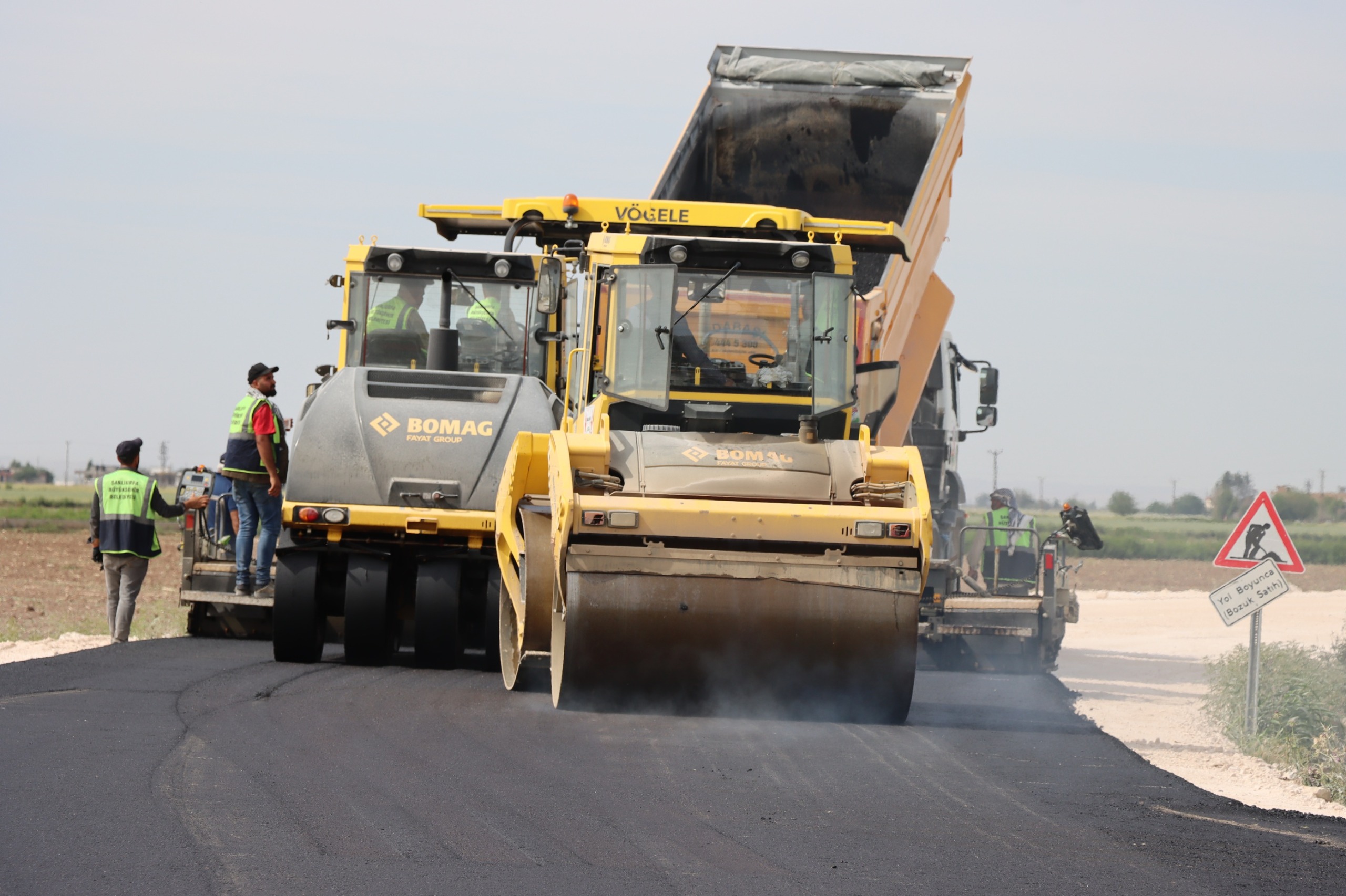 Harran-Yardımcı yolunda asfalt serimi başladı